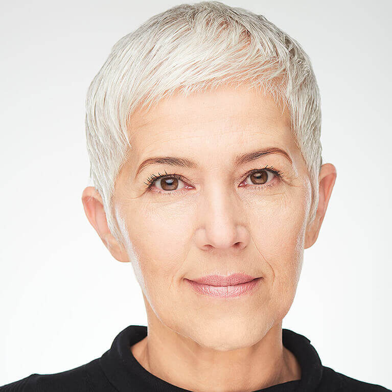 Woman with short white hair