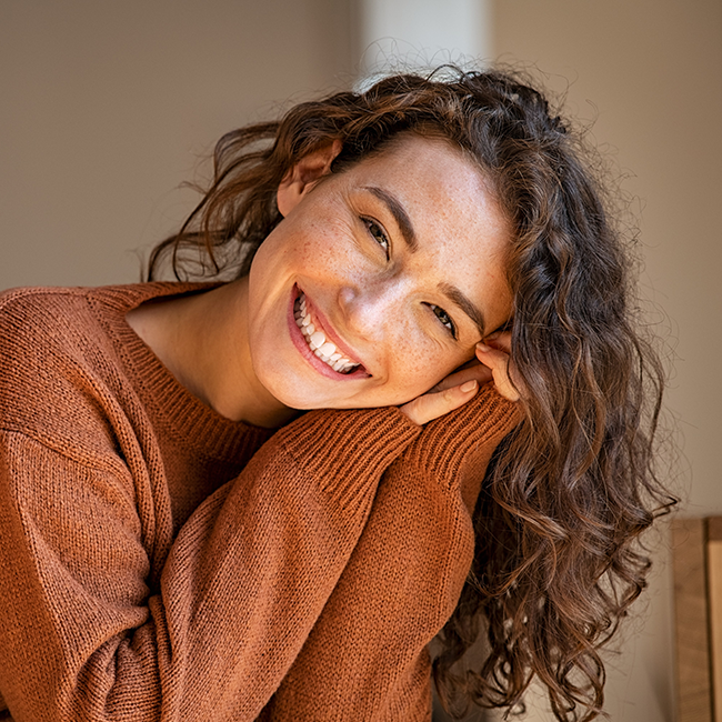 Girl in a brown sweater