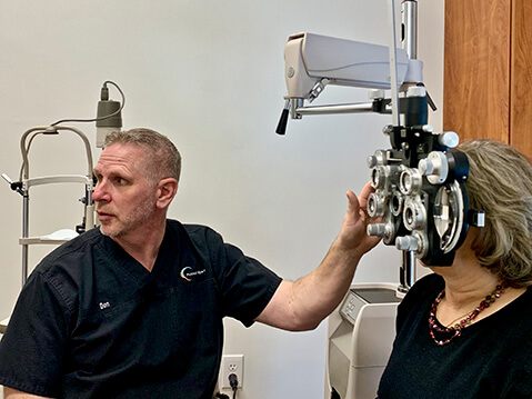 Eye doctor with patient